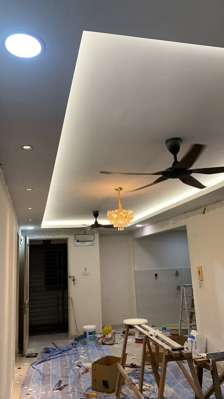 Ceiling fan and light fittings installed in a plaster ceiling by Renovix Home Services in Selangor.